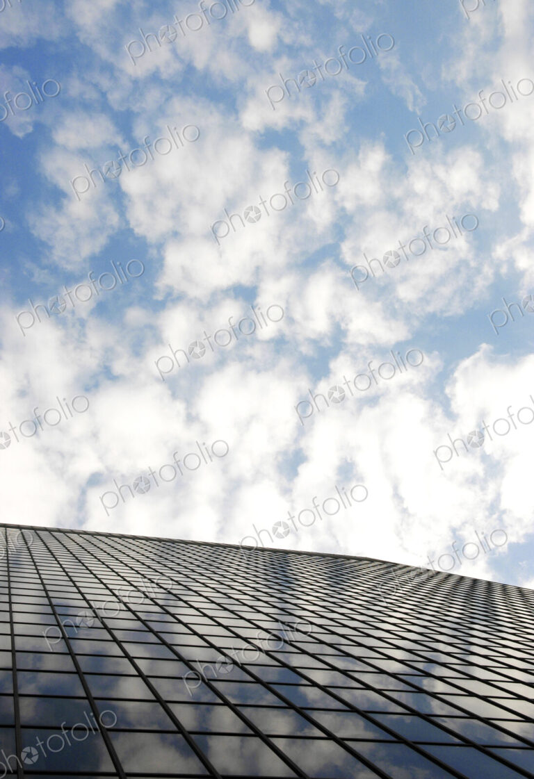 Reflection of clouds on highrise window