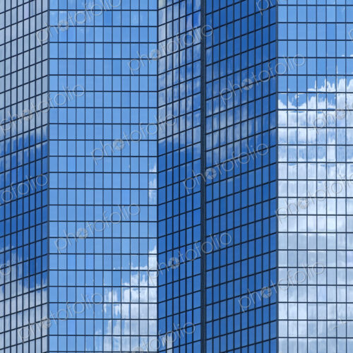 Reflection of sky in high rise skyscraper.