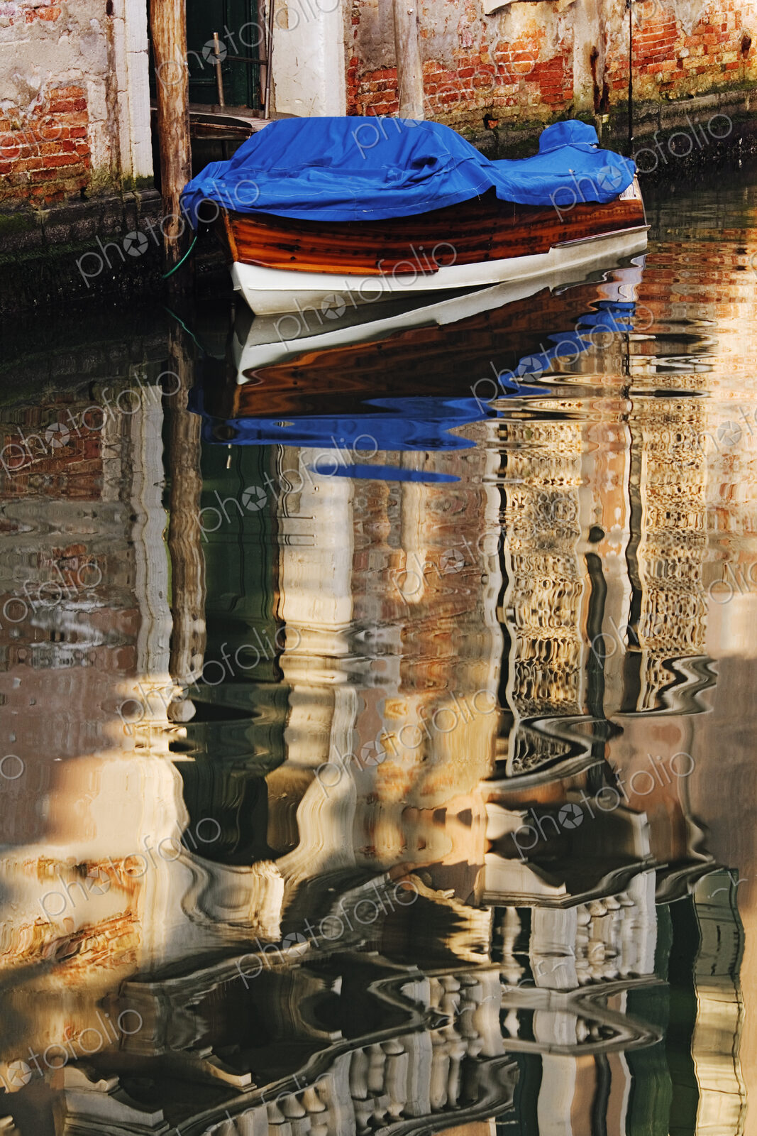 Reflections of Building in Canal