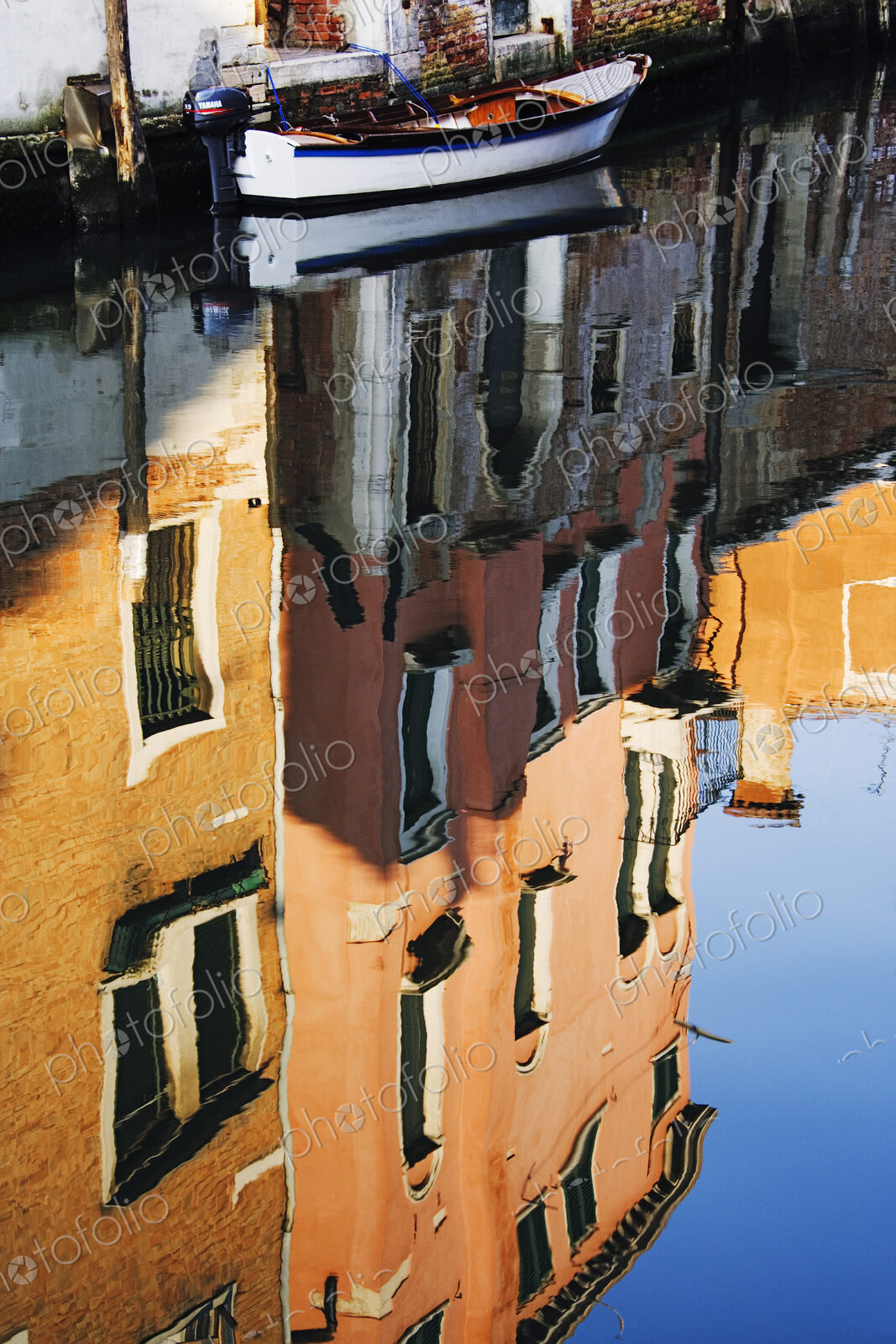 Reflections of Building in Canal