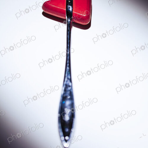 Reflex hammer, a medical tool, white background, studio shot. Reflex hammer, a medical tool, white background, studio shot.