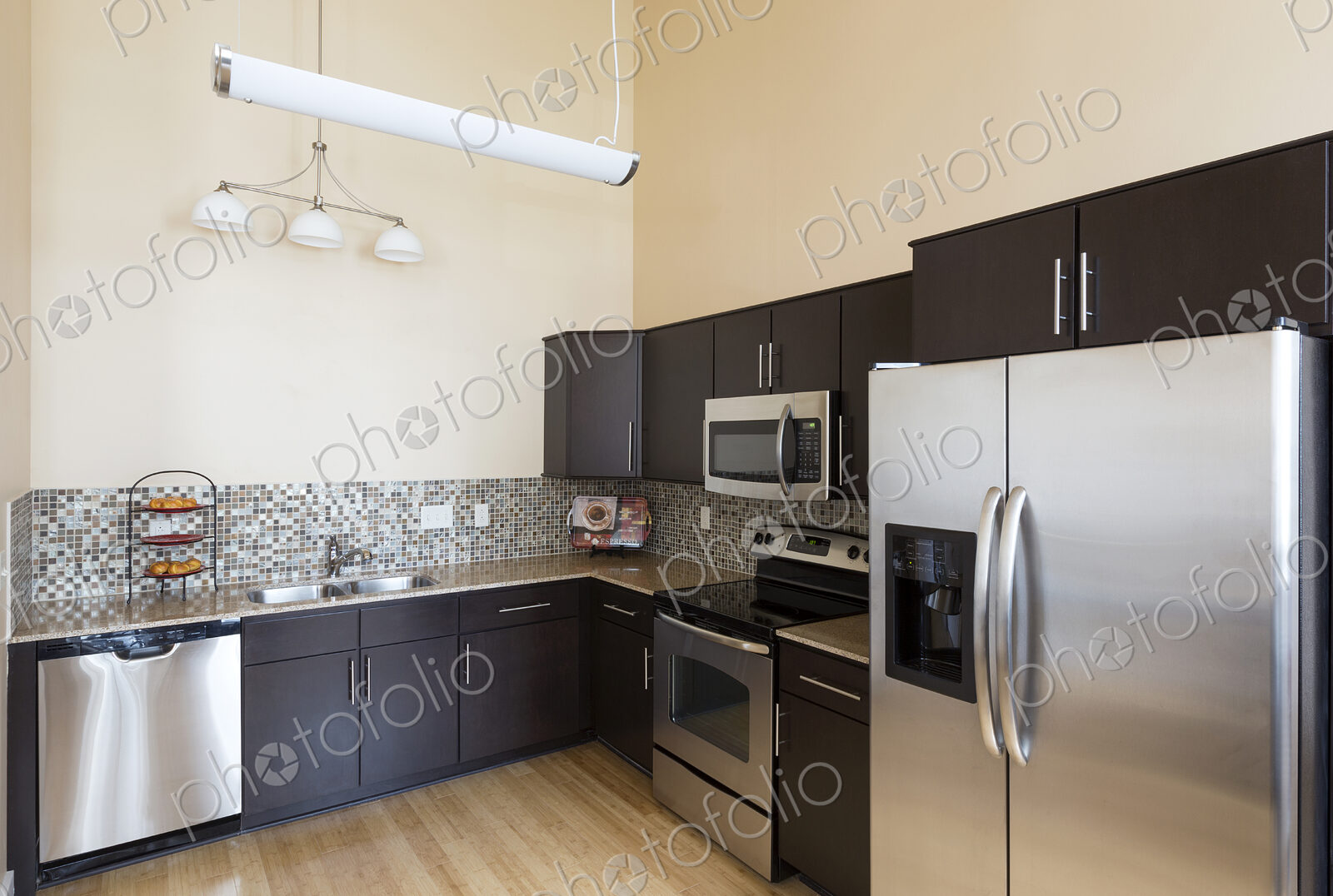 Refrigerator and counter tops in modern kitchen