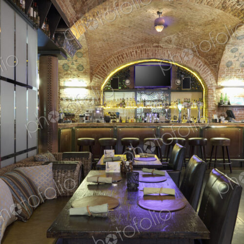 Restaurant interior with bar on background.