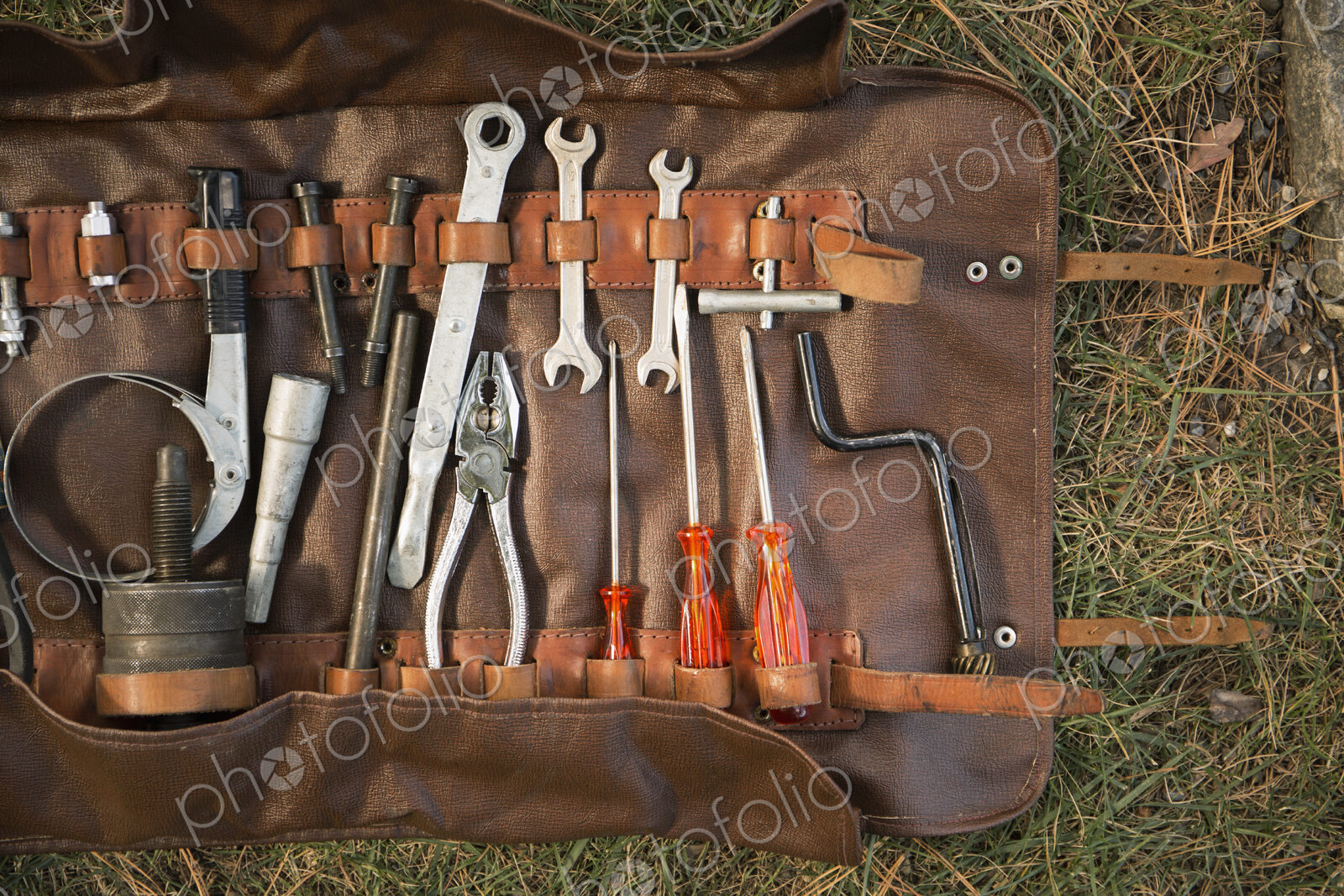 Retro Ferrari tool belt in grass