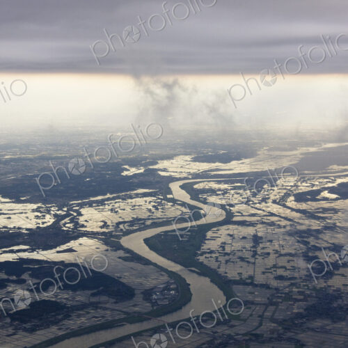 River Running through a Flooded Countryside