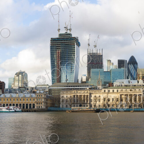 River Thames and the North Bank skyline, buildings of the City of London, a historic…