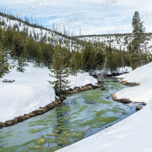 River and snowy hills in remote landscaper