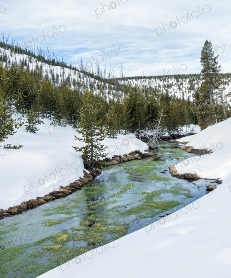 River and snowy hills in remote landscaper