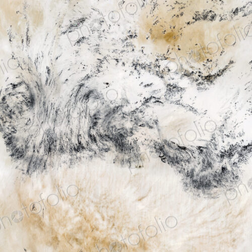 River water abstract, long exposure of river water flowing over boulders and rocks River water abstract, long exposure of river water flowing over boulders and rocks