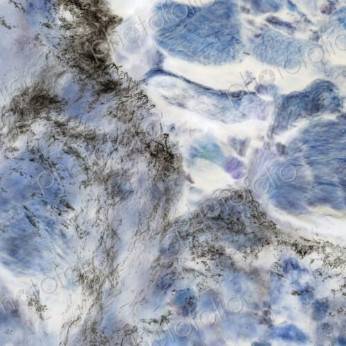 River water abstract, long exposure of river water flowing over boulders and rocks,…