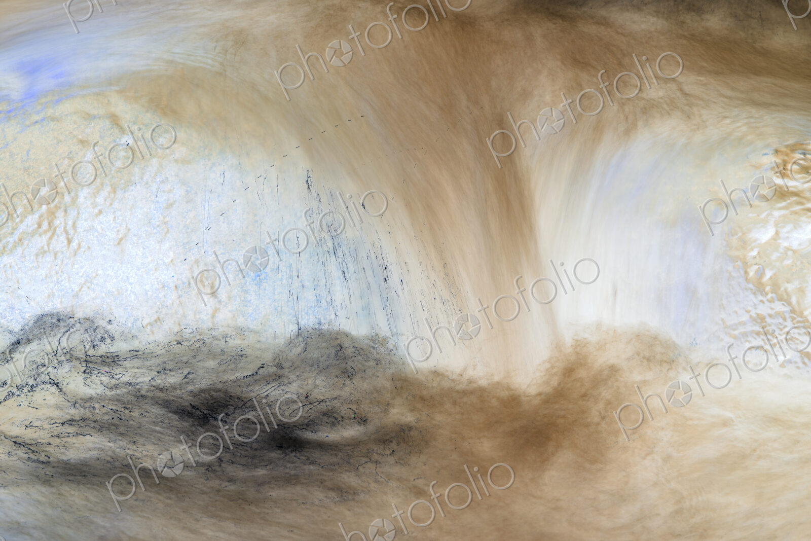 River water abstract, long exposure of river water flowing over boulders and rocks,…