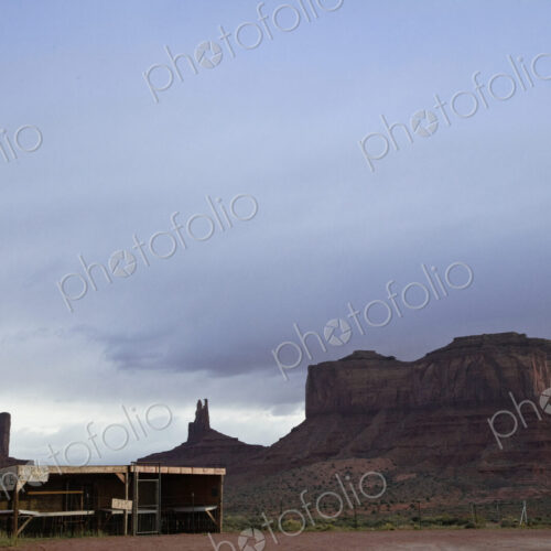 Rock formation in countryside with shed in foreground. Rock formation in countryside with shed in foreground.