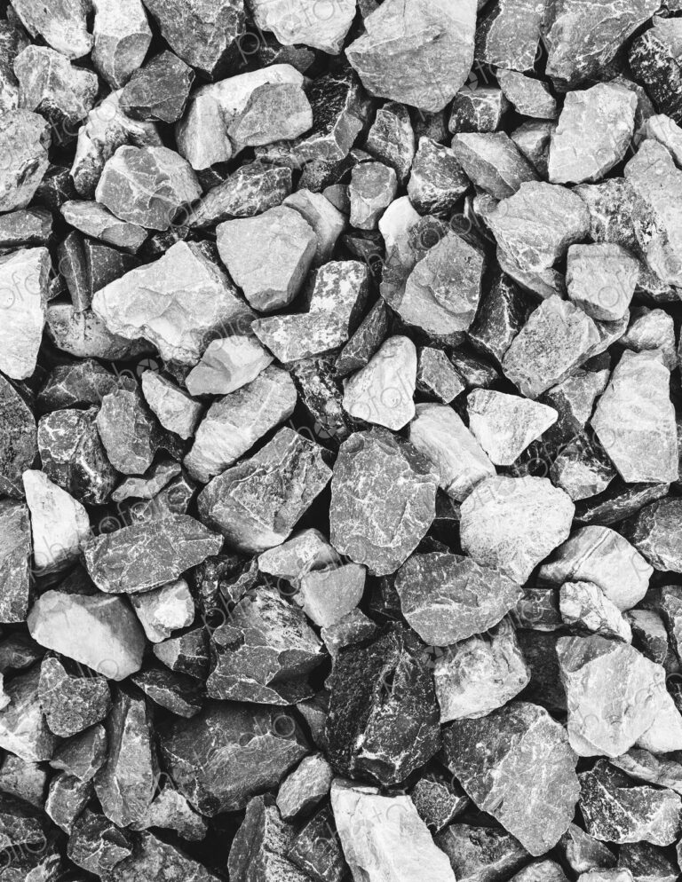 Rock pile used for construction, in King county, Washington, in the USA. Stones and…