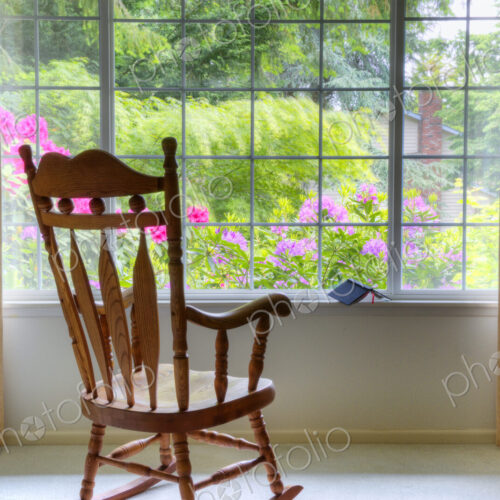 Rocking chair at living room window