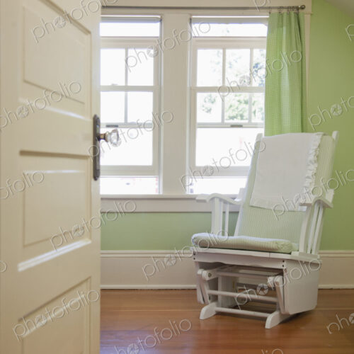 Rocking chair in nursery bedroom Rocking chair in nursery bedroom