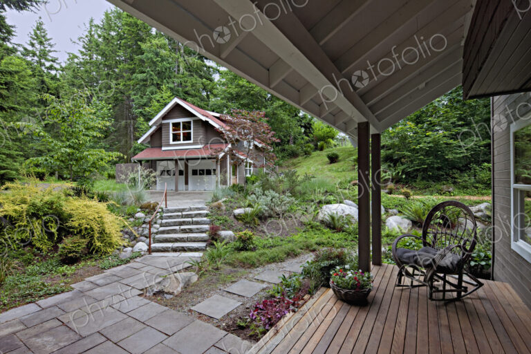 Rocking chair on porch overlooking garden