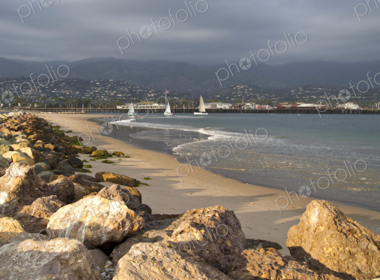 Rocky Beach and Boats on Water
