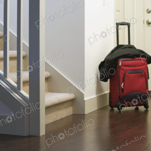 Rolling Luggage at the Front Door Rolling Luggage at the Front Door