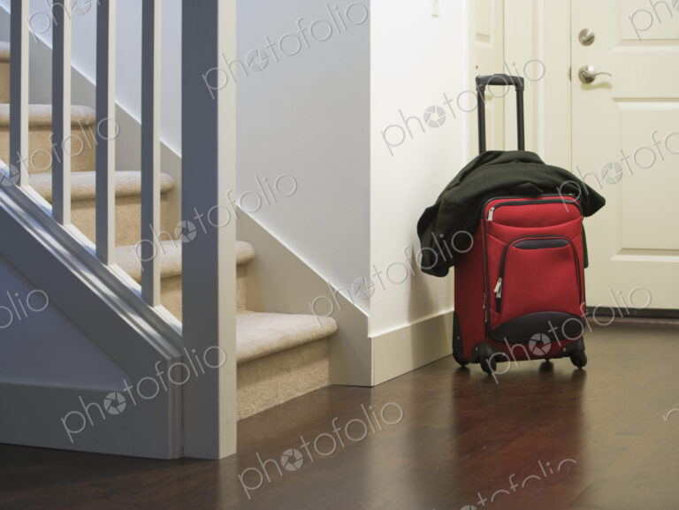 Rolling Luggage at the Front Door