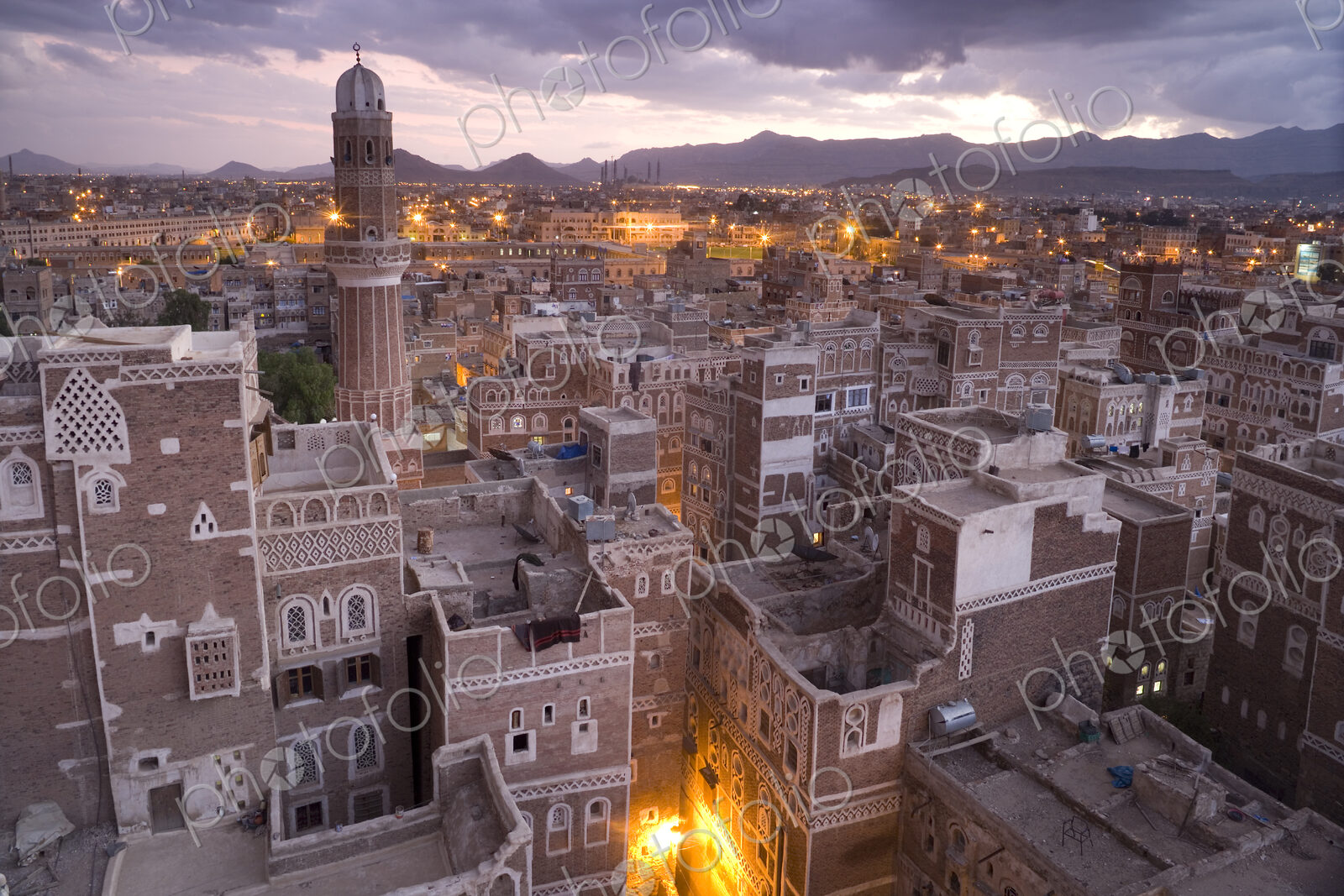 Rooftops of buildings in the old city of Sana’a in Yemen at dusk