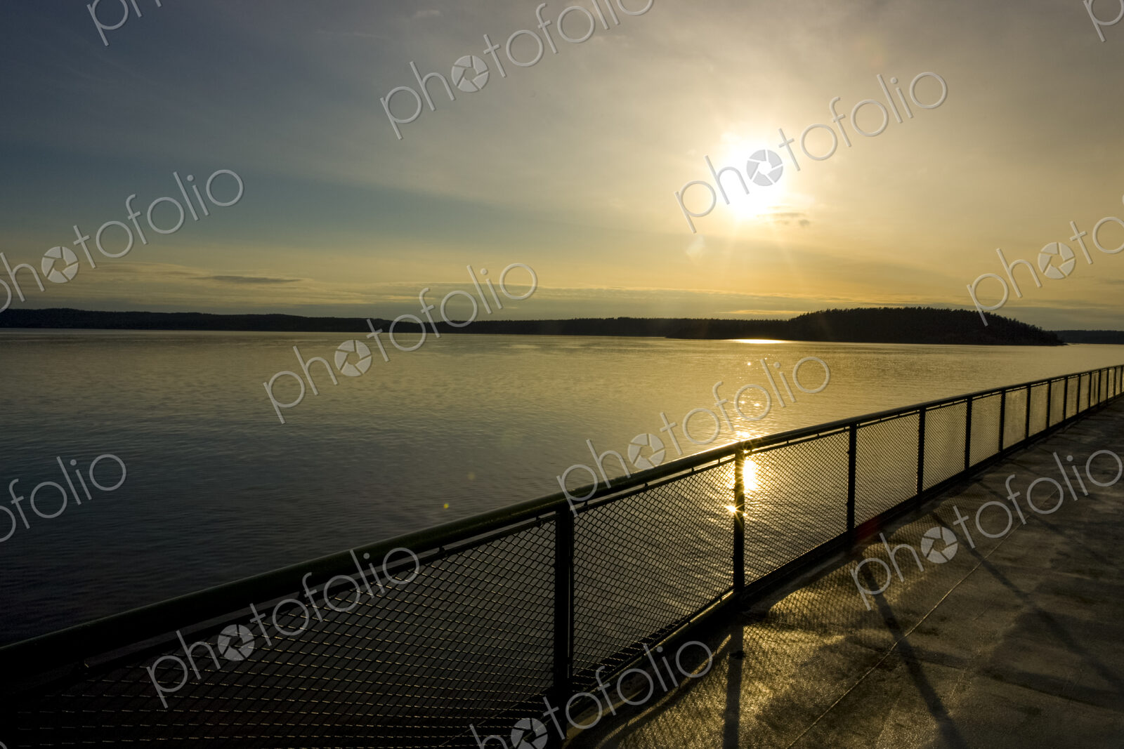 Rosario Strait and the San Juan Islands viewed from the ferry on Puget Sound, sunset.