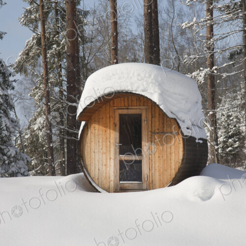 Round Barrel Sauna in the Snow