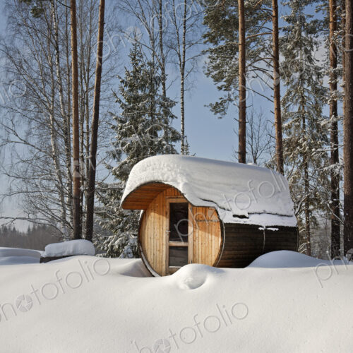 Round Barrel Sauna in the Snow Round Barrel Sauna in the Snow