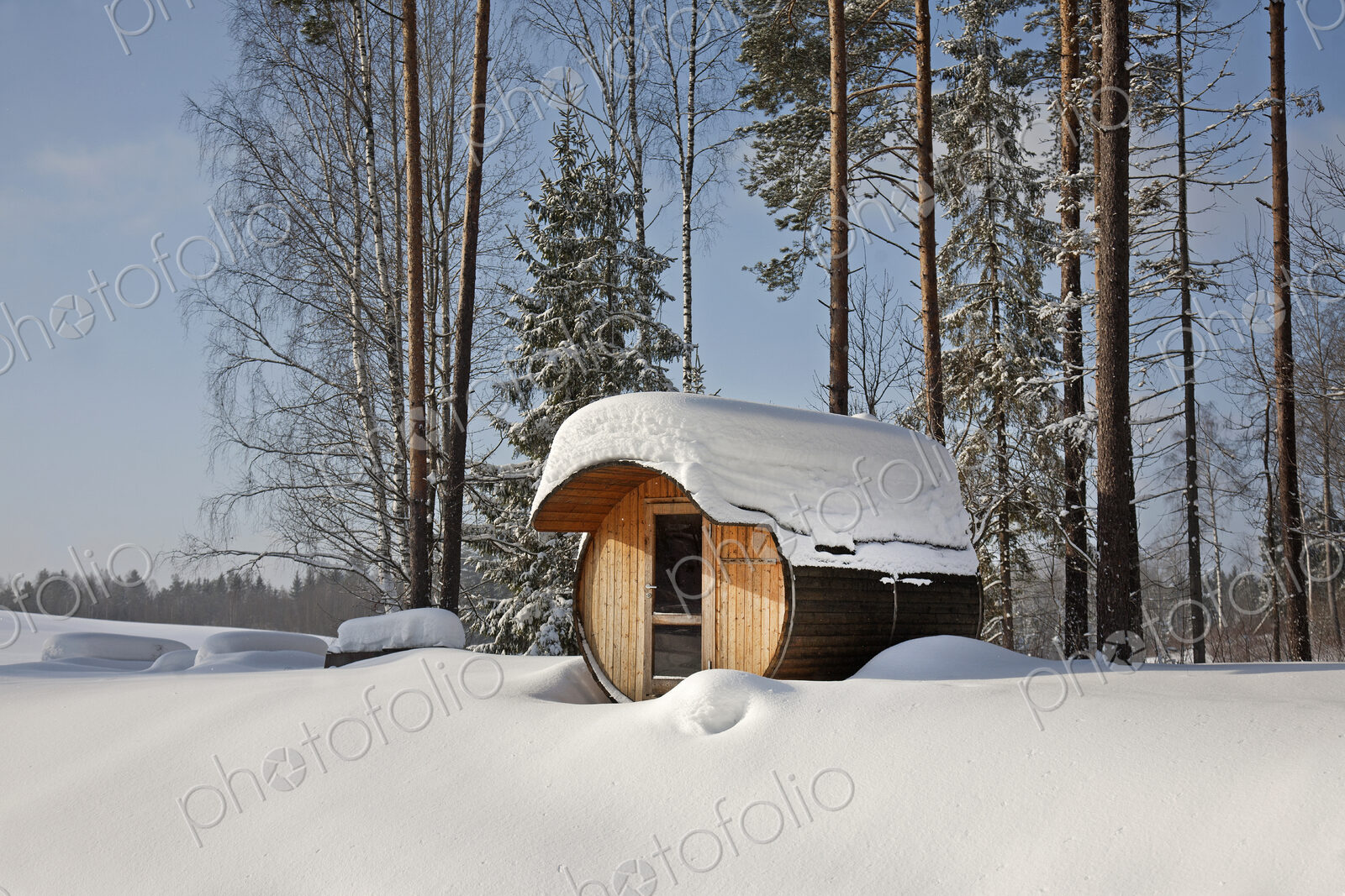 Round Barrel Sauna in the Snow