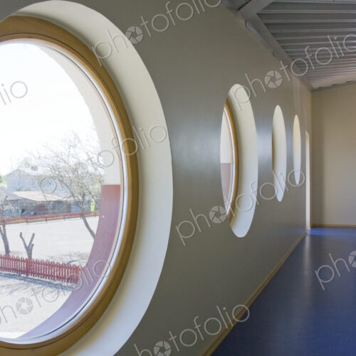 Round Windows in a school corridor. Round Windows in a school corridor.