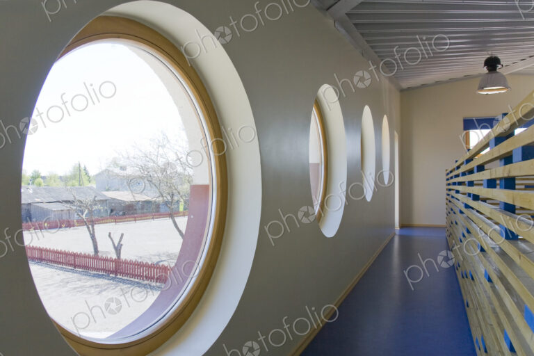 Round Windows in a school corridor.