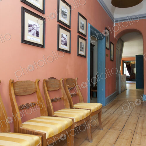 Row of Chairs in a Manor Hall Row of Chairs in a Manor Hall