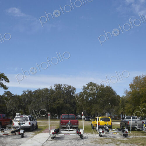 Rows of Vehicles With Boat Trailers