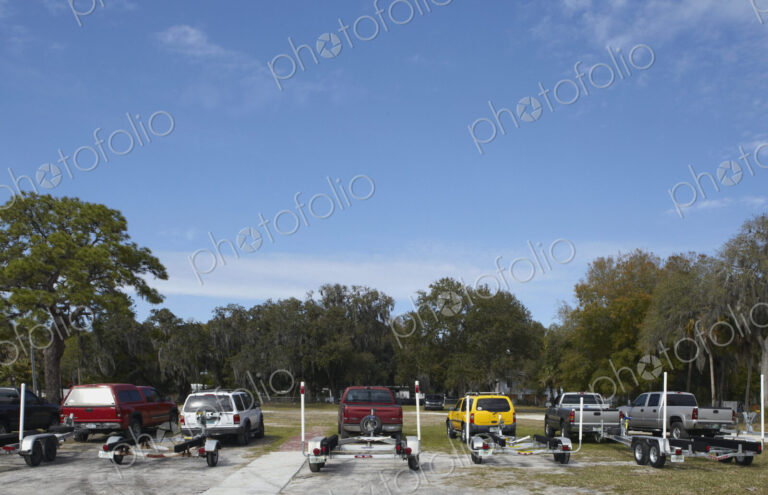 Rows of Vehicles With Boat Trailers