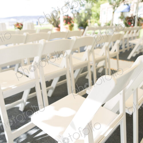 Rows of White Folding Chairs Rows of White Folding Chairs