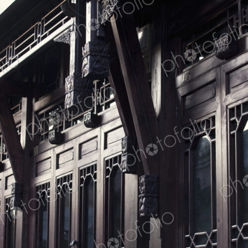 Rows of Wood Doors on Ornate Building Exterior Rows of Wood Doors on Ornate Building Exterior