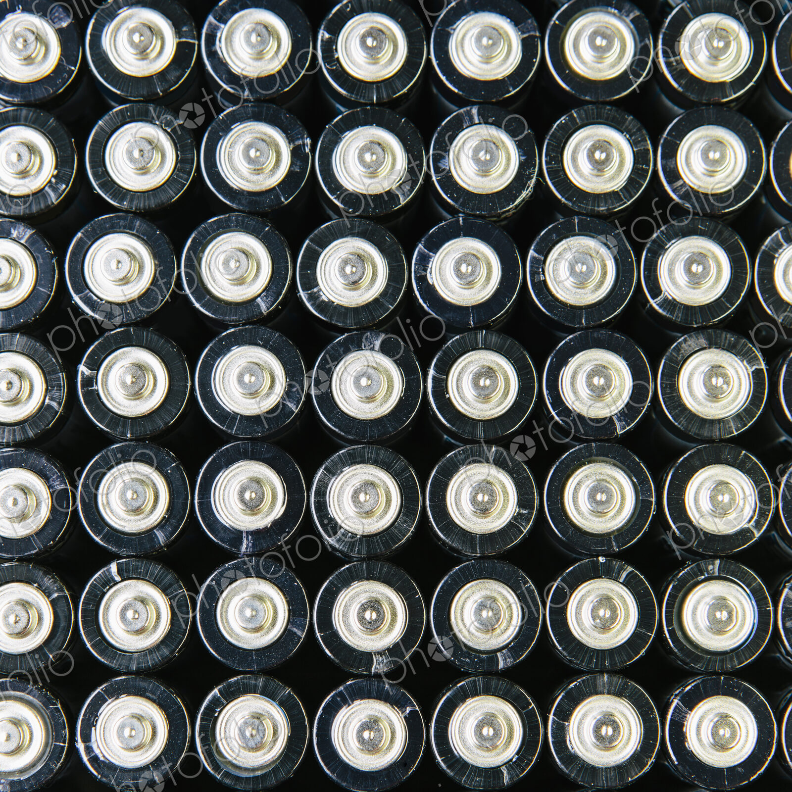Rows of double A batteries, close up