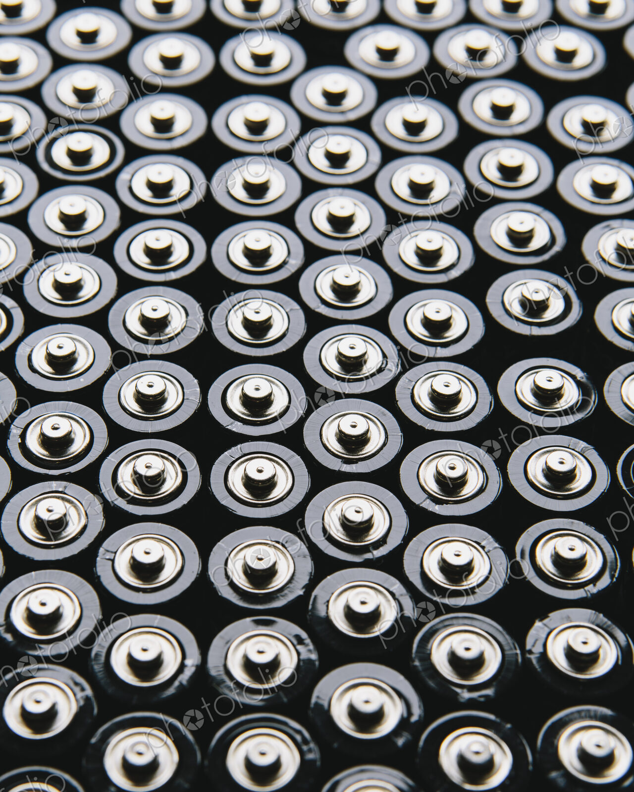 Rows of double A batteries, close up