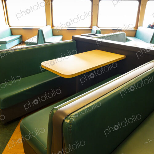 Rows of seats and booths on the Spokane Ferry, Seattle, WA USA Rows of seats and booths on the Spokane Ferry, Seattle, WA USA