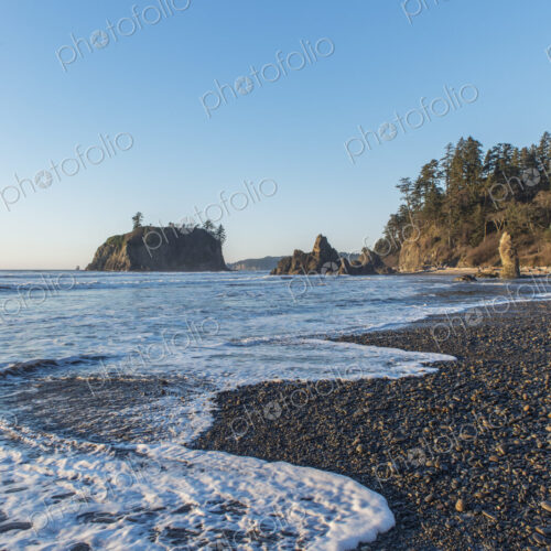 Ruby Beach, the water's edge and view to the seastack and cliffs of the coast. Ruby Beach, the water's edge and view to the seastack and cliffs of the coast.
