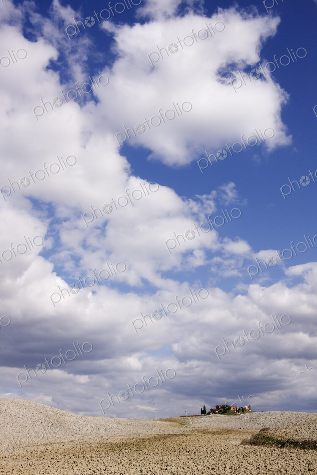 Rural landscape with clouds above.
