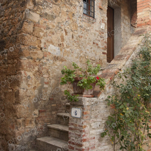 Rustic entryway into a traditional Tuscan home. Rustic entryway into a traditional Tuscan home.
