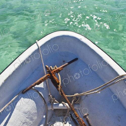 Rusty Anchor In Bow Of Boat