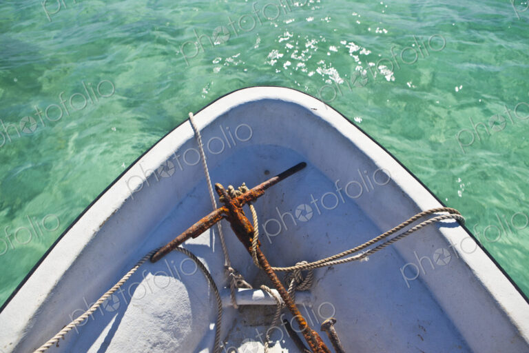 Rusty Anchor In Bow Of Boat