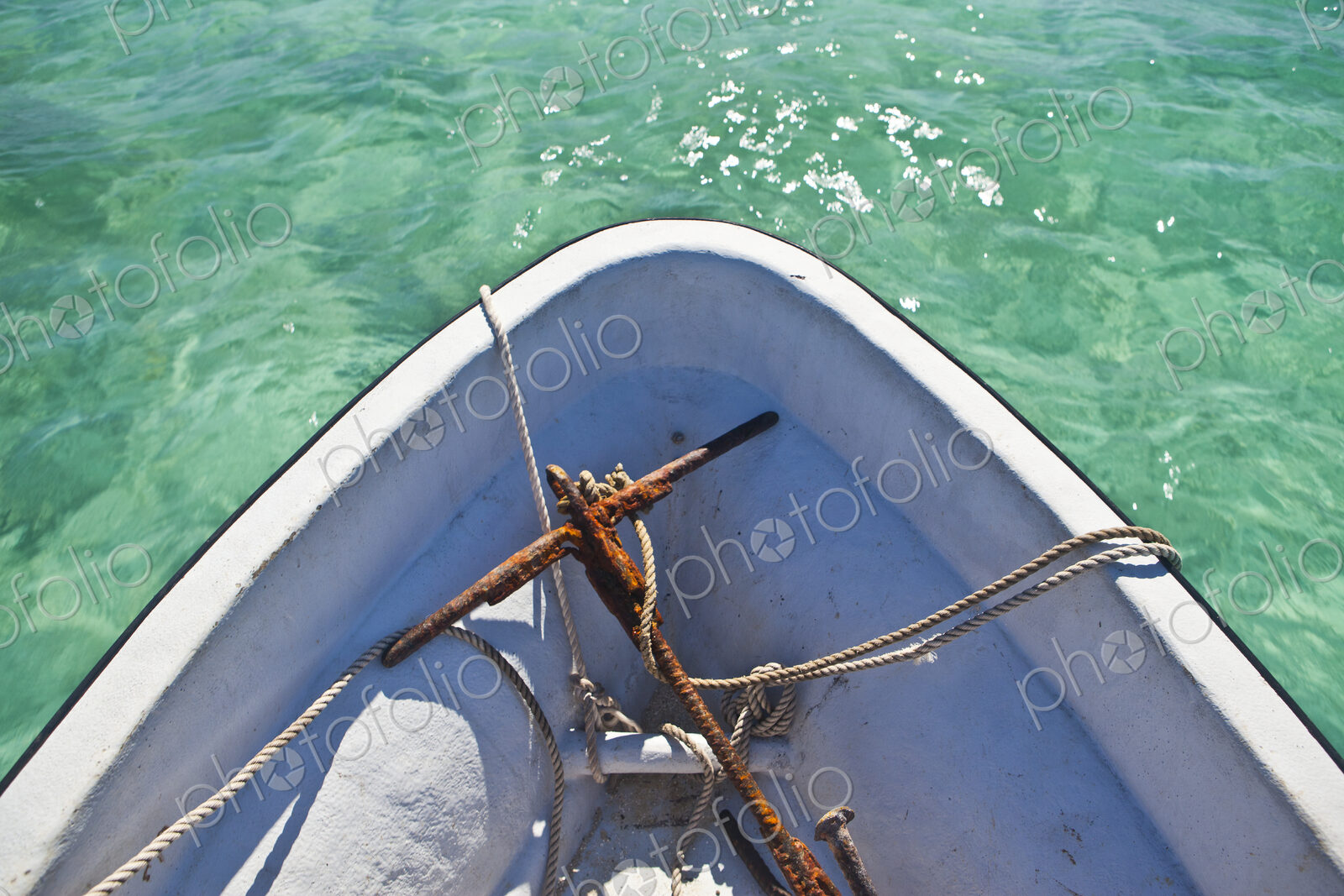 Rusty Anchor In Bow Of Boat