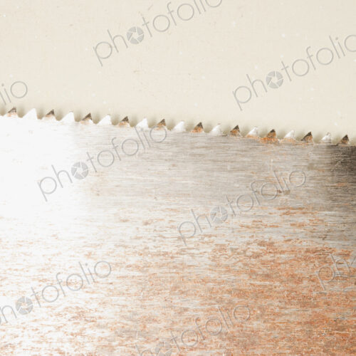 Rusty handsaw edge. Rusty handsaw edge.