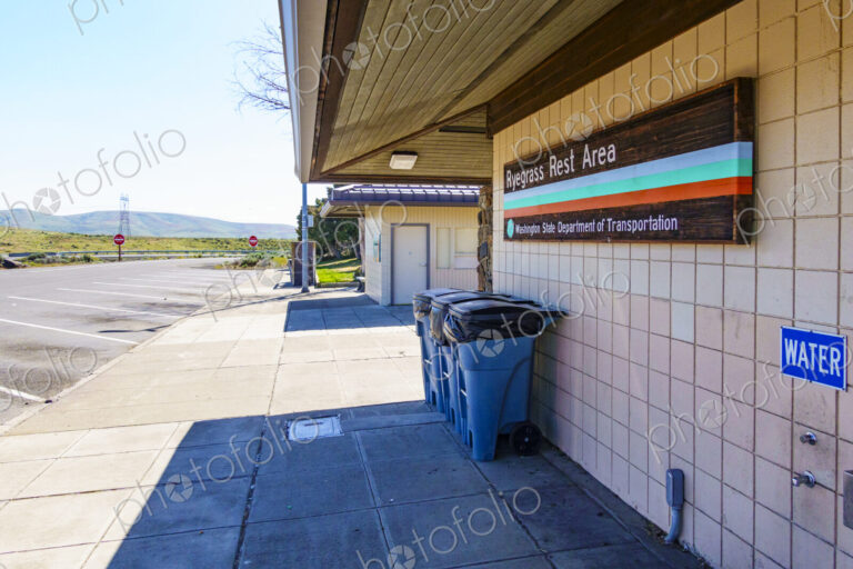Ryegrass Rest Area on Interstate 90, garbage cans, water tap and parking spaces.