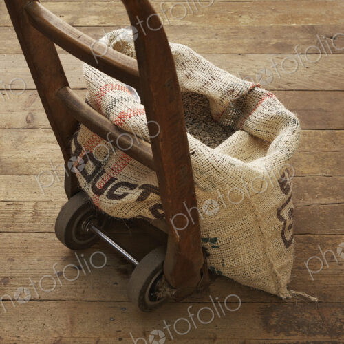 Sack of coffee beans on dolly Sack of coffee beans on dolly