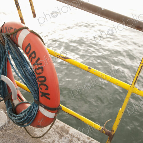 Safety Equipment on Dry dock, lifebelt and ropes Safety Equipment on Dry dock, lifebelt and ropes