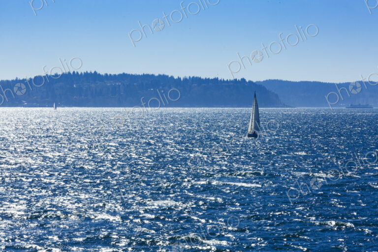 Sailboat on Puget Sound in windy conditions, near Seattle, WA USA