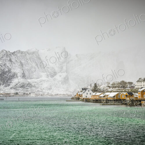 Sakrisoya Island, the mountain coastline and small town in the Lofoten islands…